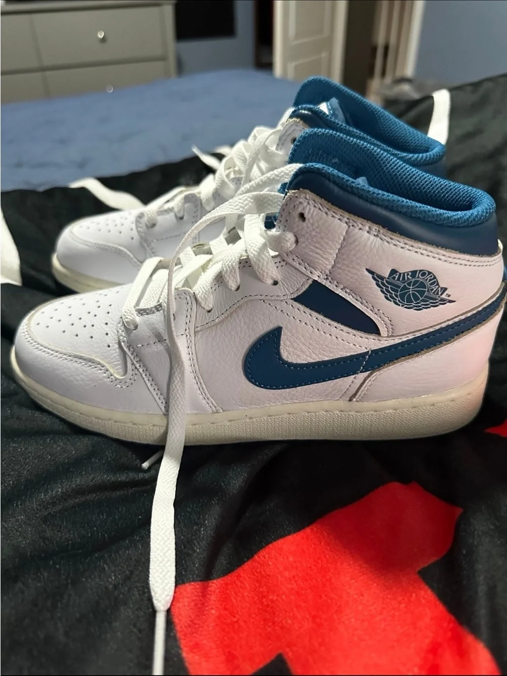 Jordan Retro High Top Sneakers in White and Blue